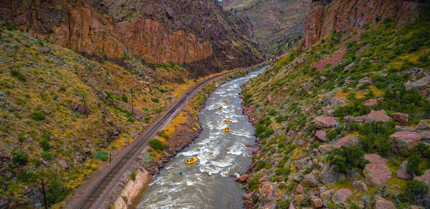 Aerial view of the Royal Gorge canyon with rafts running the Arkansas River